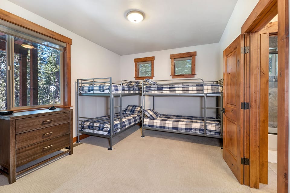 Downstairs bunk room with adjoining Jack and Jill bathroom.