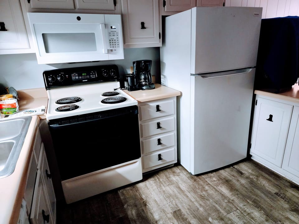 Brand New Appliances - Refridgerator, microwave and dishwasher