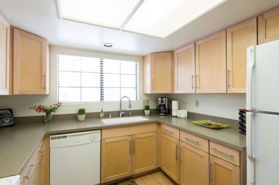 Beautiful windows in the kitchen. Lot's of storage room.. 