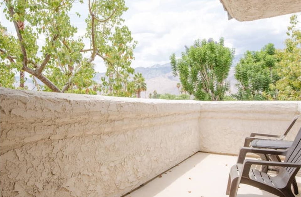 This balcony is from the guest bedroom it over views the mountains.