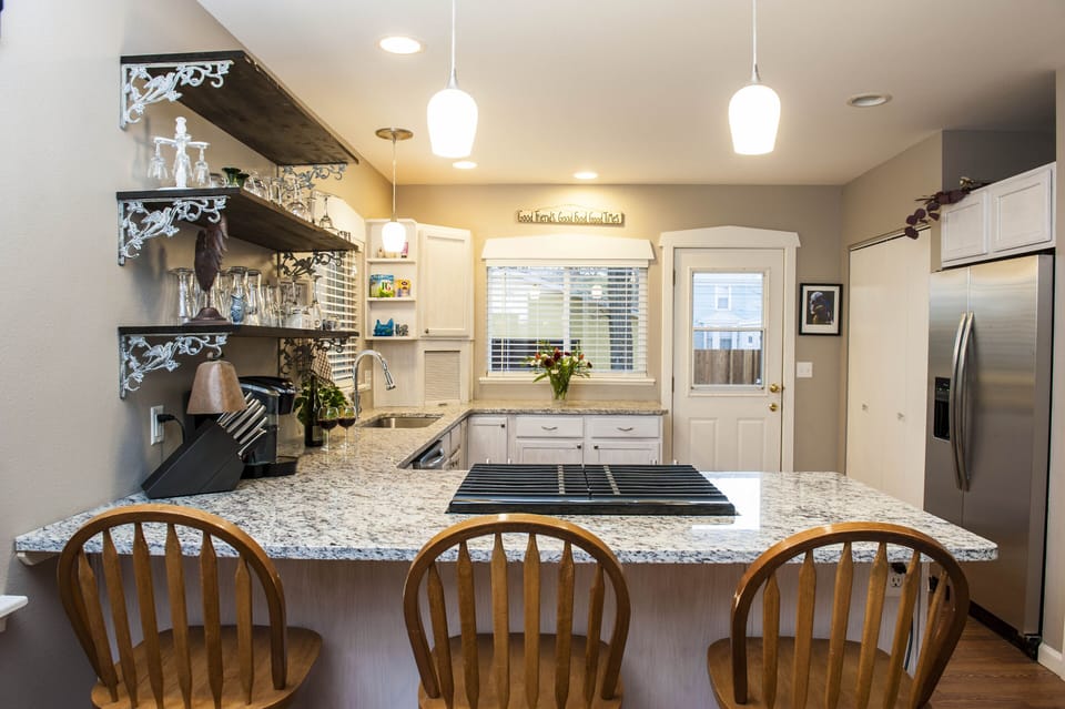 gas cooking and thoughtfully laid out, well-appointed kitchen 