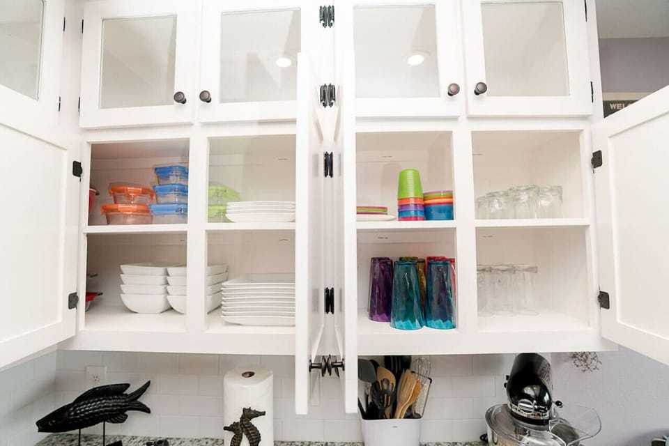 Fully stocked kitchen!  Everything you need and MORE to have a good time!  And a Kitchen Aid mixer to help you bake your favorite cookies!!
