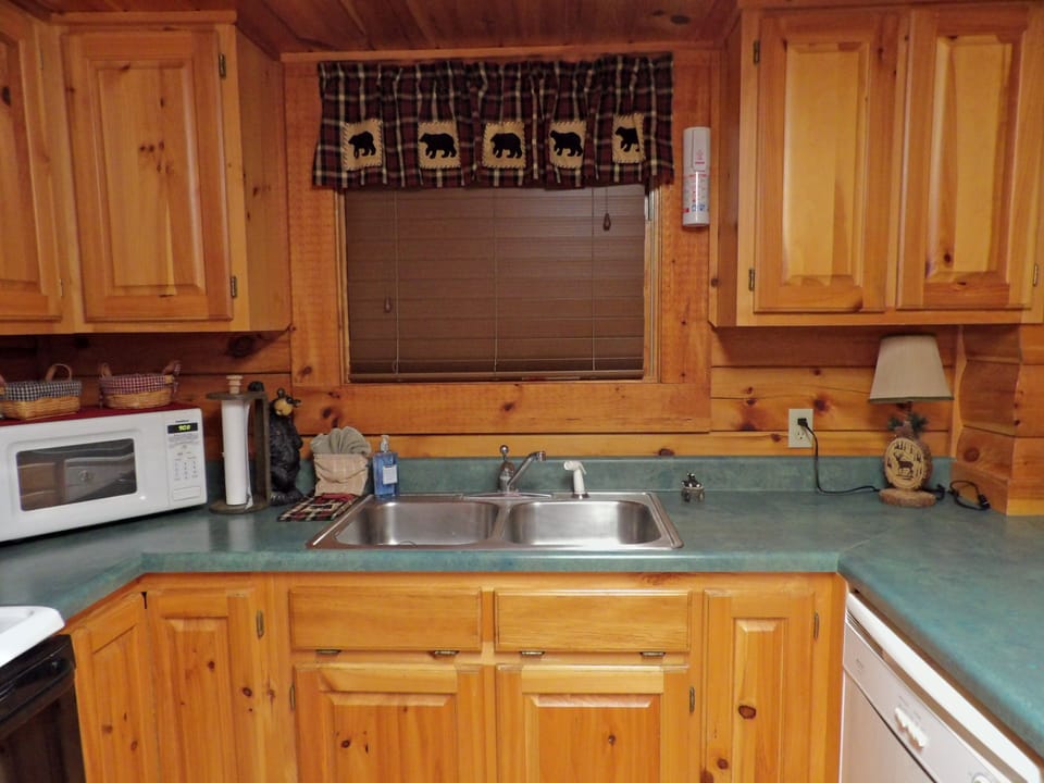Full function kitchen with oven, stove, dishwasher, microwave and Kcup/auto drip
