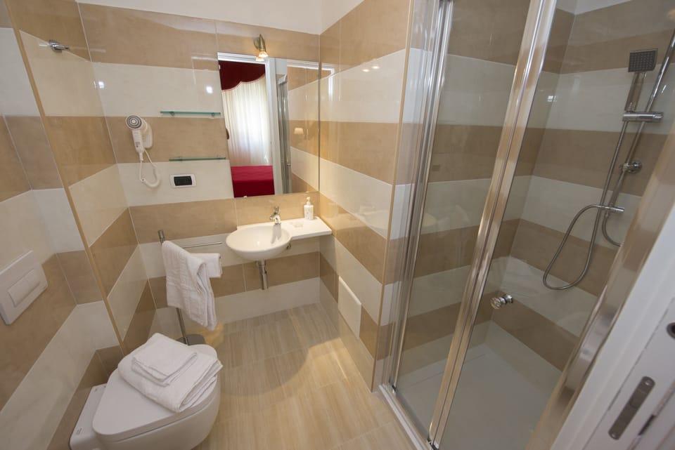 Rainfall showerhead, free toiletries, hair dryer, bathrobes