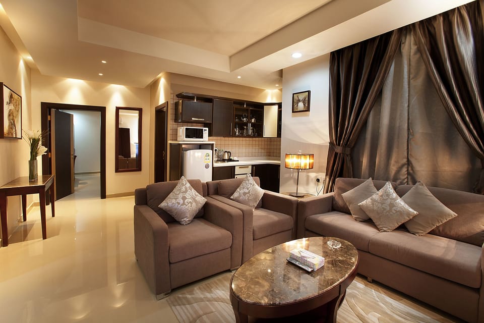 Standard Double Room, 2 Bedrooms | Living room | TV