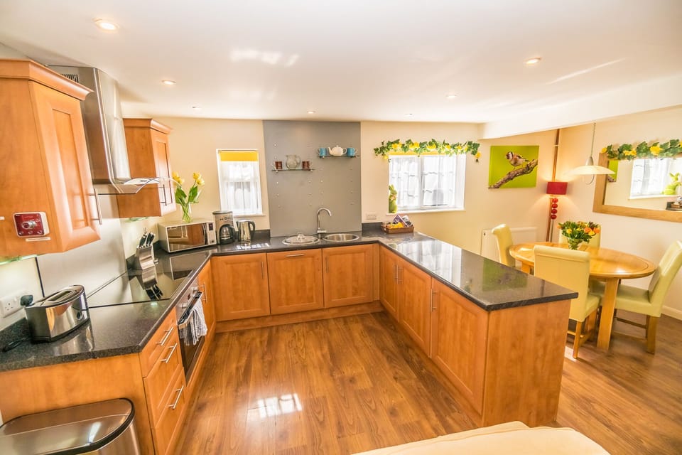 The large kitchen is fully equipped. Everything you need, just bring the food. 