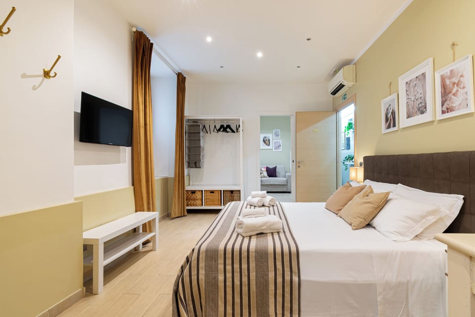 Family Quadruple Room, Private Bathroom | Down comforters, desk, blackout drapes, soundproofing