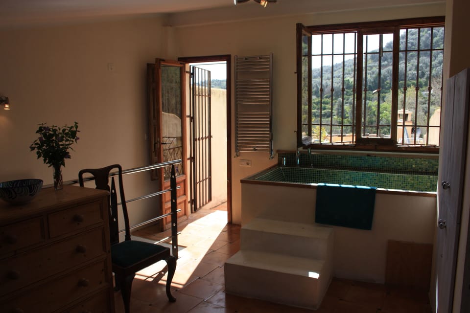 Top floor bedroom opens on to terrace