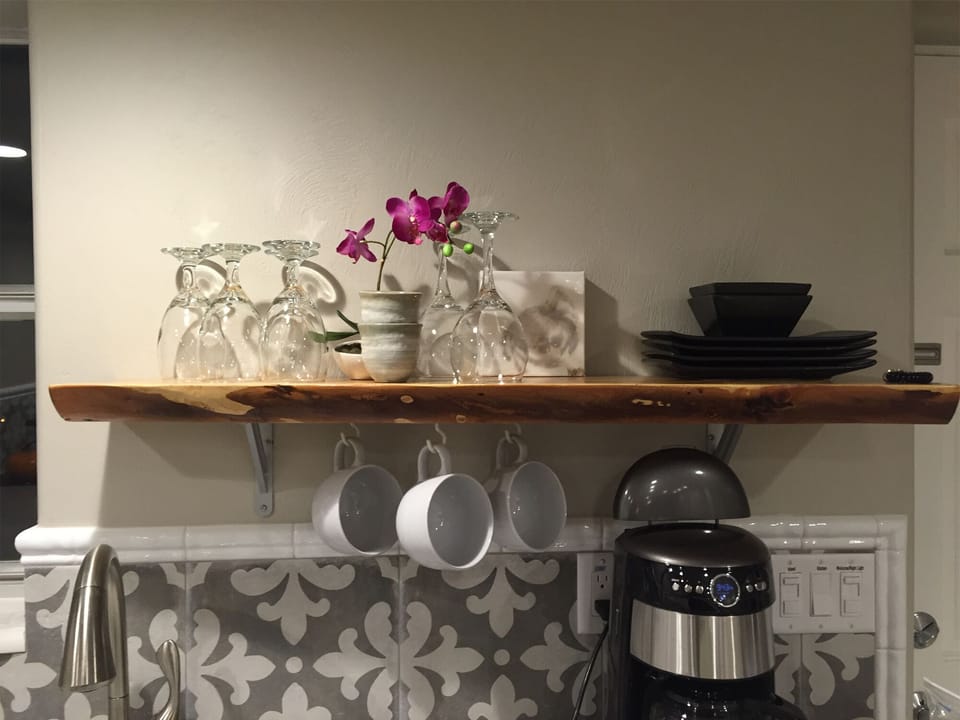 Coffee/ Breakfast Bar all living on the live edge reclaimed natural wood slab. 