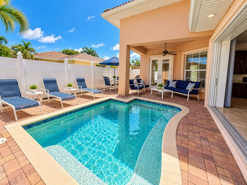 Pool/Spa. Lounge chairs and conversation set. Plenty of seating