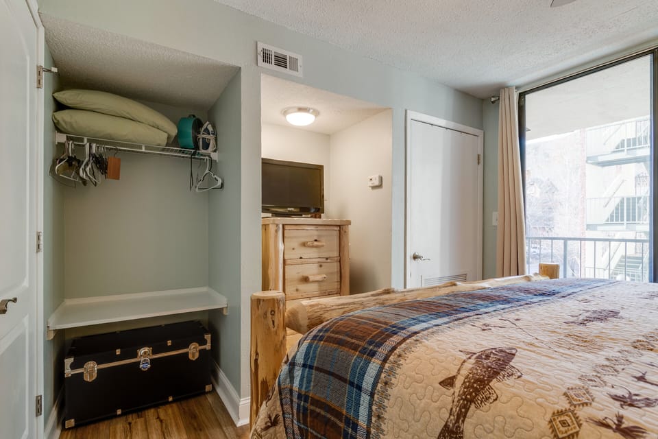 New log dresser, king log bed and log end tables  in bedroom 
