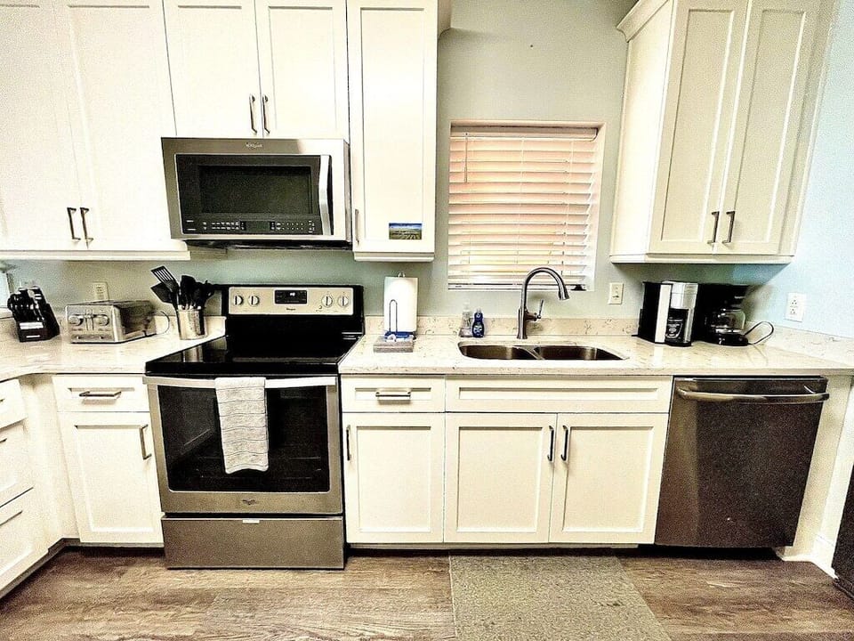 Kitchen with stainless steel appliances Oceanview, 102 Isle of Palms, SC | IOP Escapes
