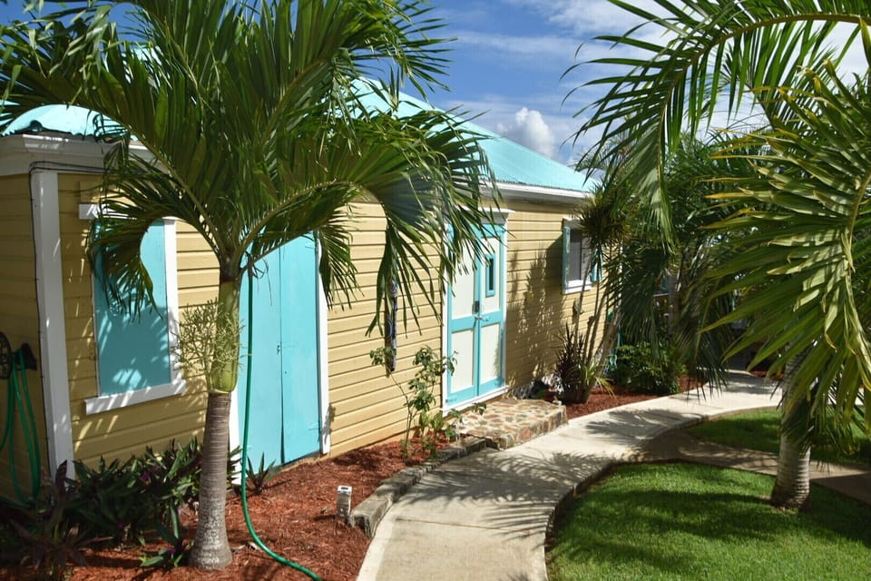 Walkway to the Frenchman's villa. One queen bedroom one bunk room. Living space,