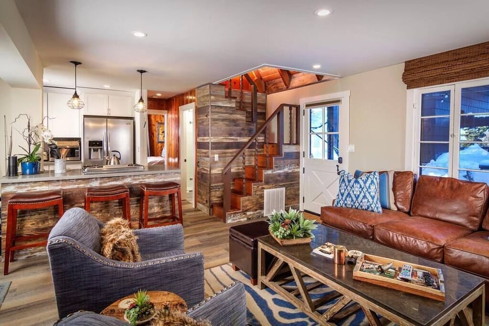 Lower Level | Stunning original staircase accesses upper bedrooms