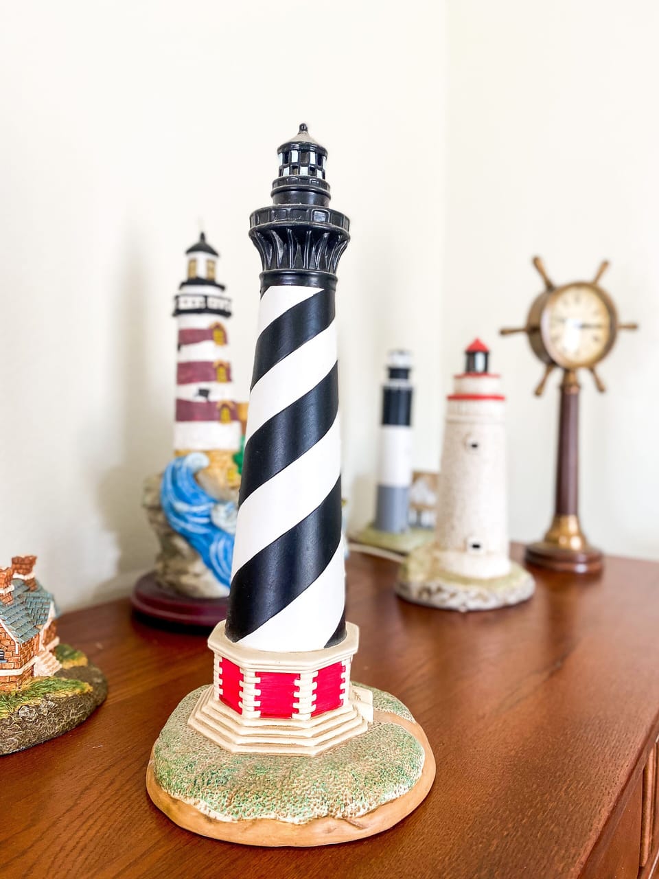 Bedroom #3 has a queen bed, lake views, dresser and television.