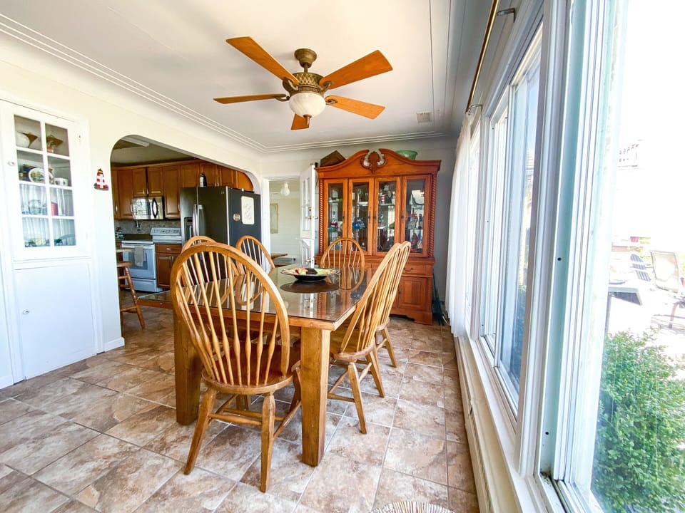 Dining area has 6 chairs just off the kitchen. Lots of natural light & lake view