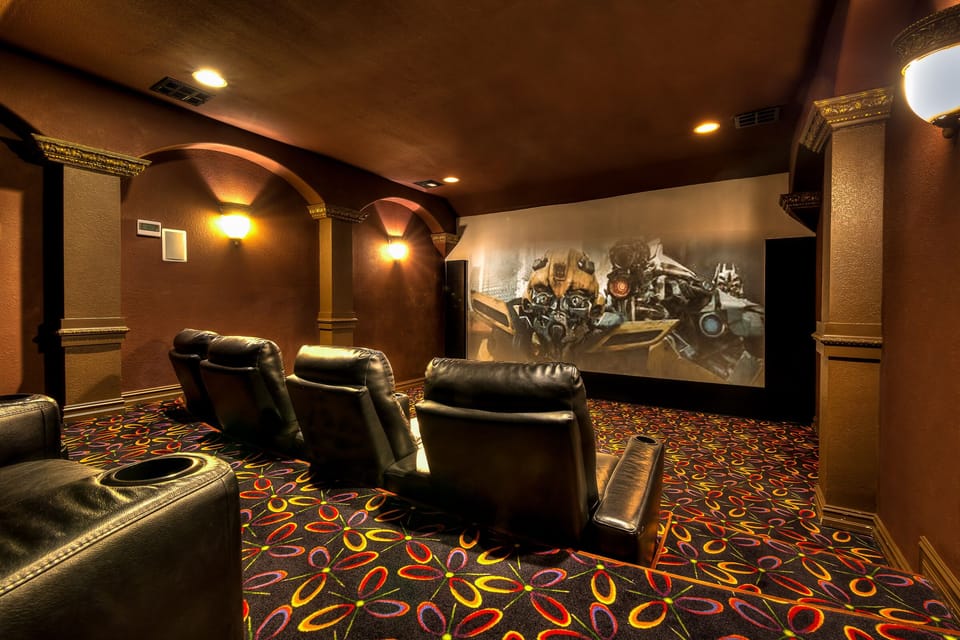 Home Theatre with 150 inch screen, 7.1 surround sound and 8 reclining chairs