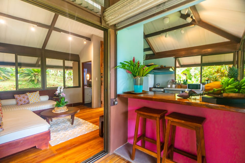 Villa Cacao. Another view of the kitchen with bar and the sitting area. 