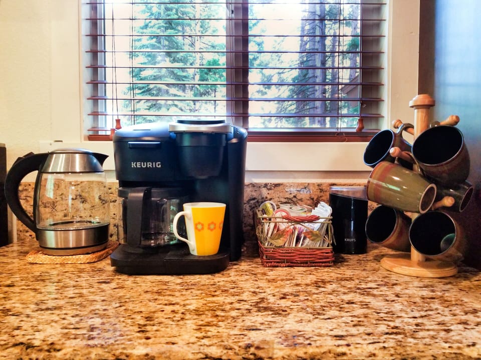 Coffee Bar: Duo Keurig, Elec Kettle, Grinder, Grounds, Tea, Coco, Cream, Sugar 