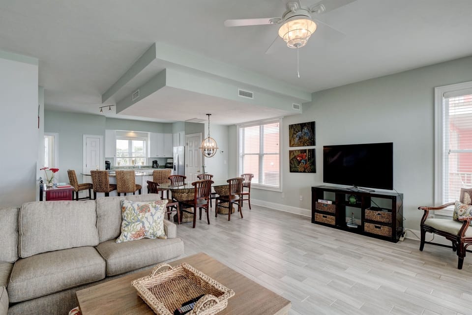 Open concept living including 65" smart TV