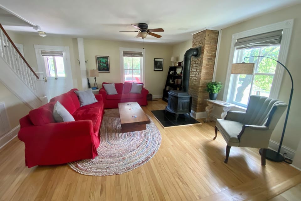 Living room which opens into the kitchen.