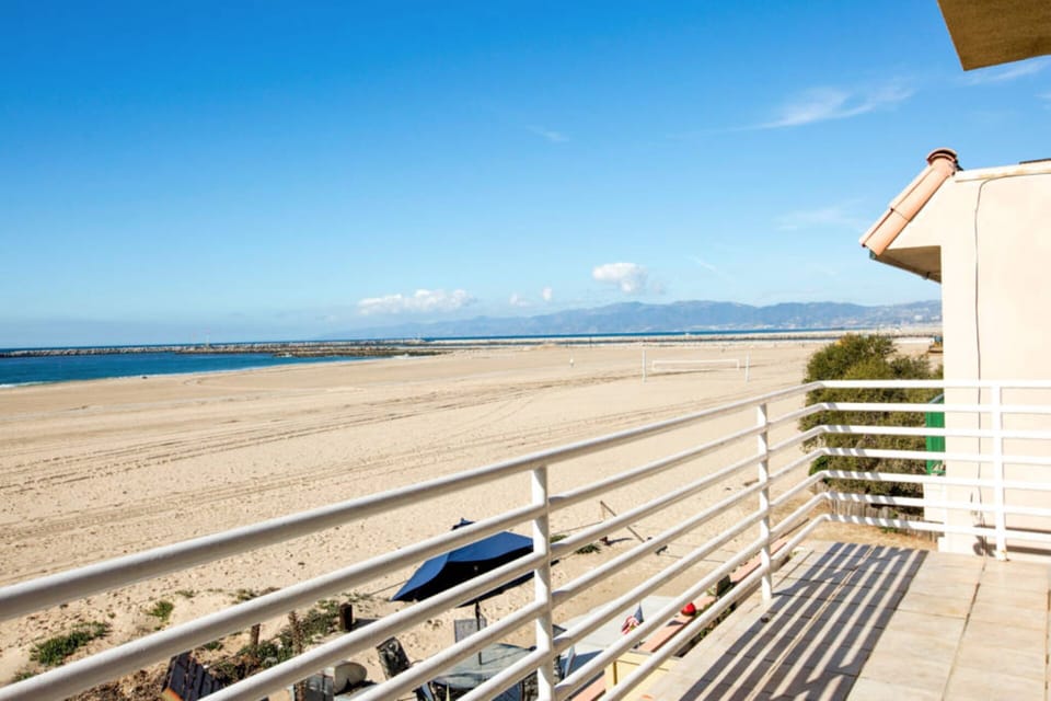 Step onto the Master Suite's Private Terrace for unobstructed sand & ocean views