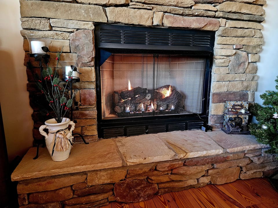 A simple button on the wall starts the fire.   Operational in fall & winter.