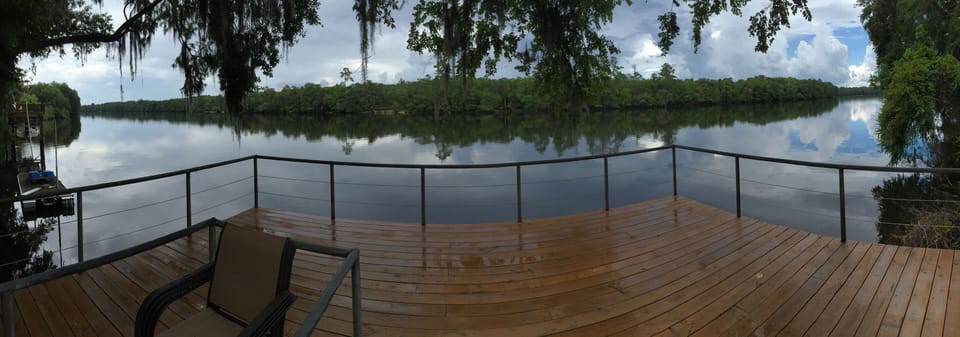 River side view of the home. 