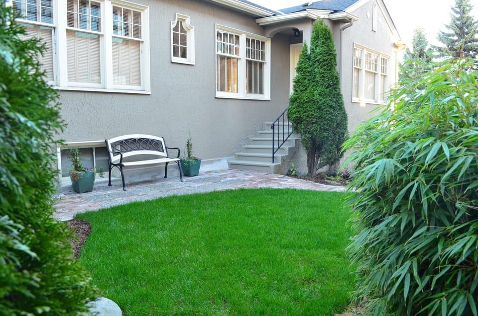 Enjoy the peaceful outdoor area.  Relax on the bench or read a book on the lawn.