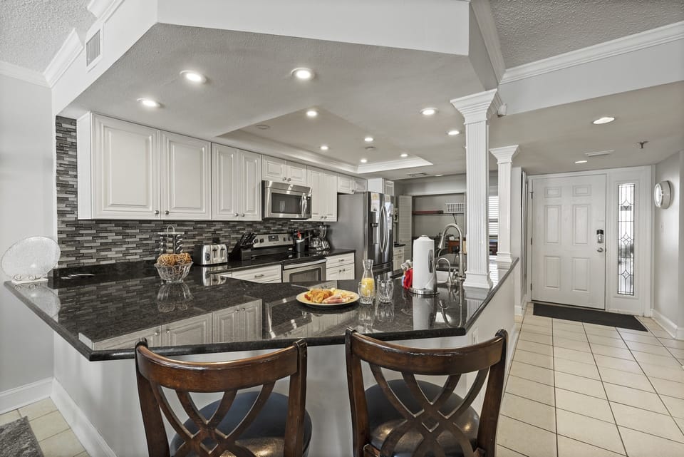 Completely redesigned open concept kitchen provides plenty of counter space