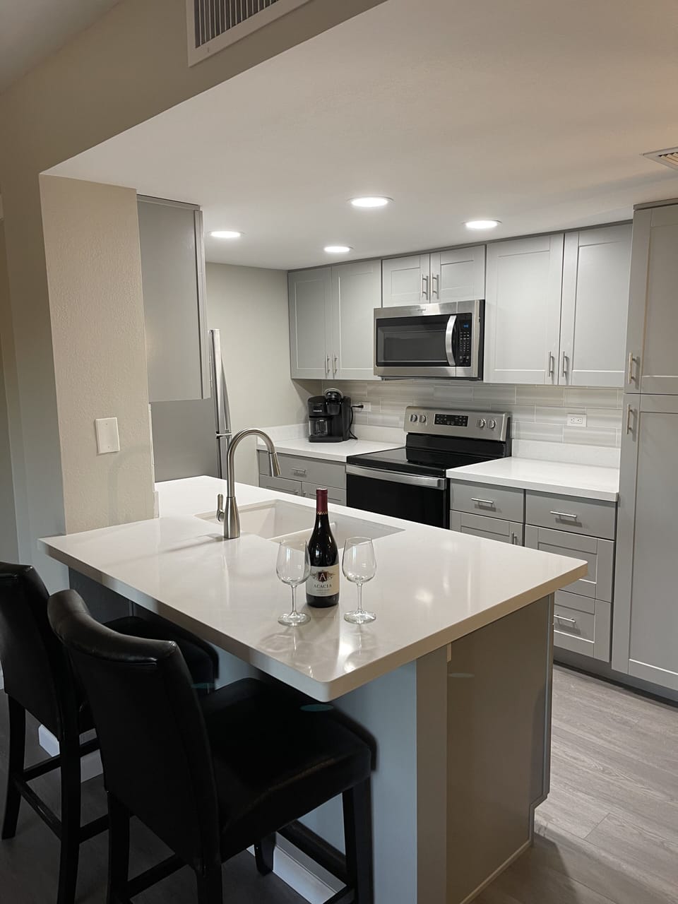 The view from the family room into the kitchen
