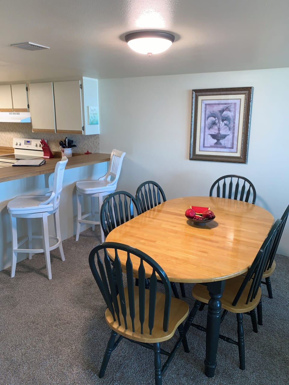 Dining table seats 6 and 2 can sit at the counter.
