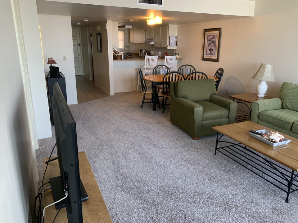 New plush carpeting in the living room and bedrooms to soften toddler’s falls