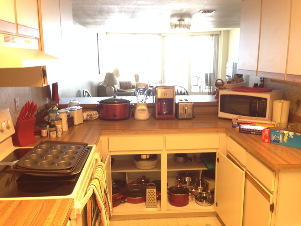 Kitchen extras: crock pot, blender, hand mixer, spices, wraps, baggies & a view.