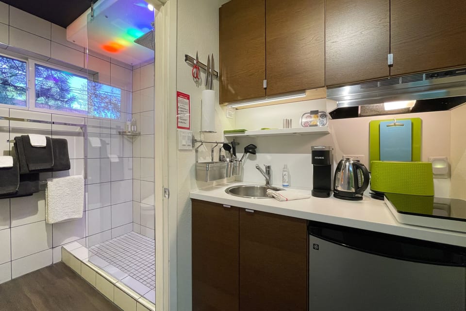 Microwave, fridge, toaster, water pot & induction hotplate. Keurig.