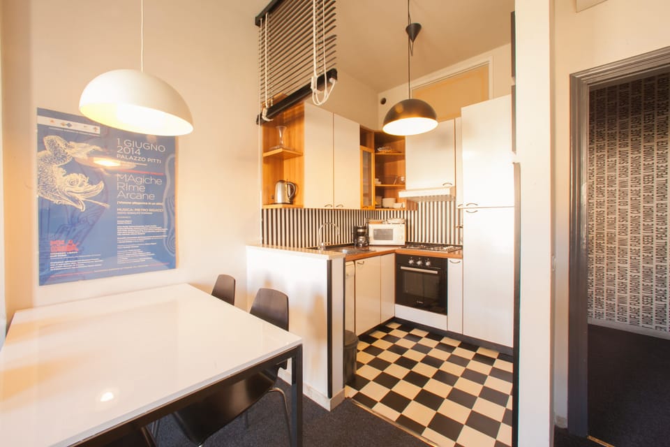Dinner table and kitchen