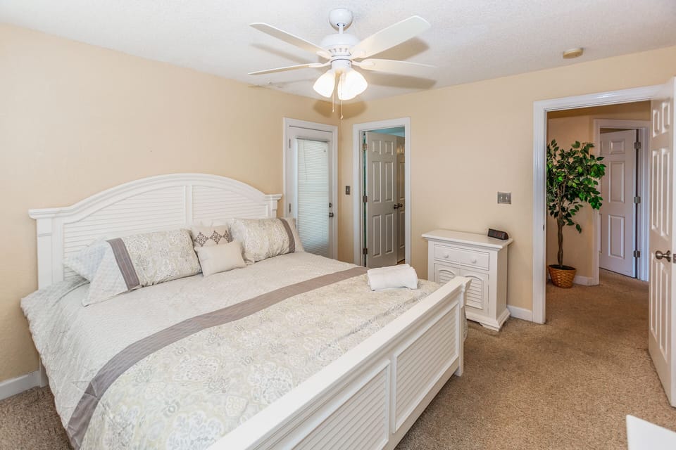 Mid Level King Bedroom with Jack and Jill Bathroom.  Access to Wrap Around Deck.