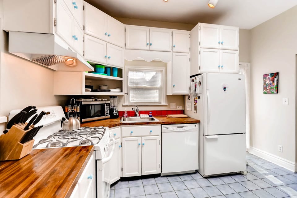 Fully stocked Kitchen with Butcher Block Countertops and Gas Range/Oven