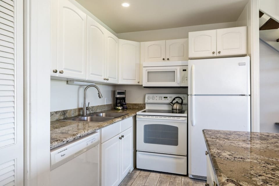 Simple, clean kitchen ready for easy vacation cooking.