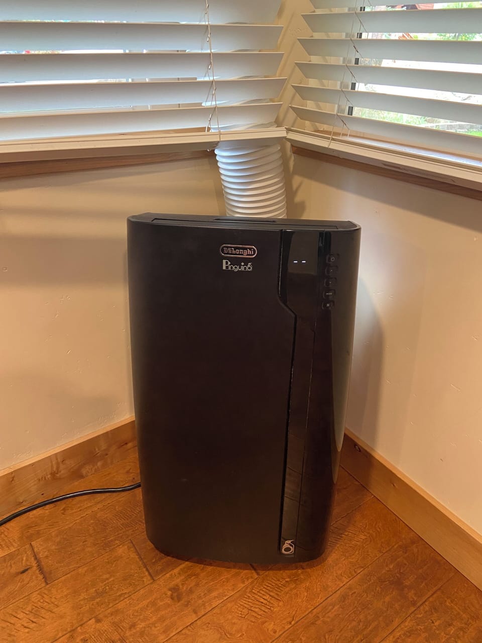 Portable AC unit available in Summer by dining room / living room area.  