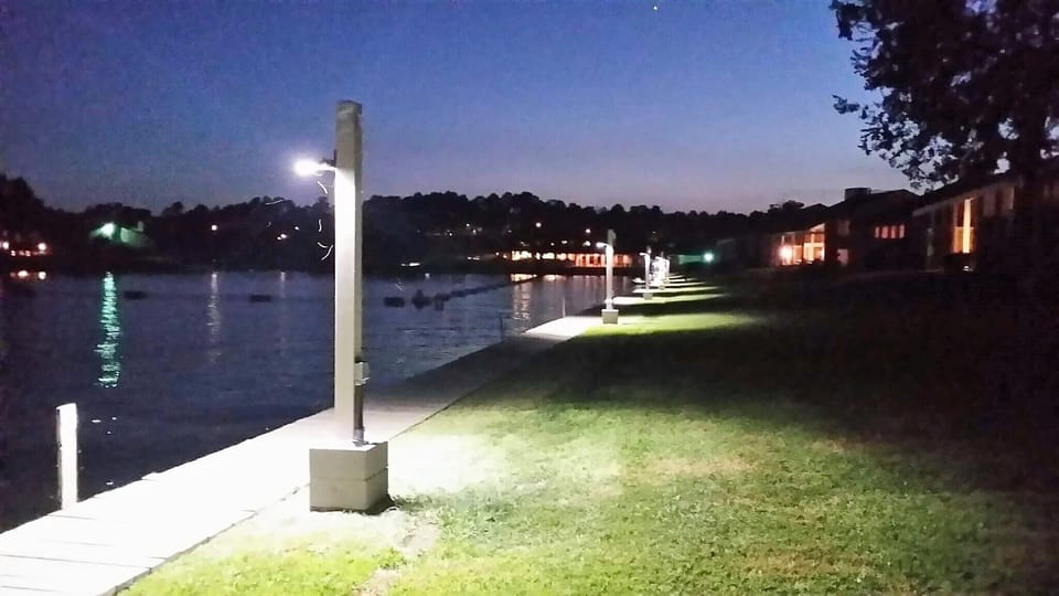 Boardwalk is lit up at night. Take a stroll or drop a line. 