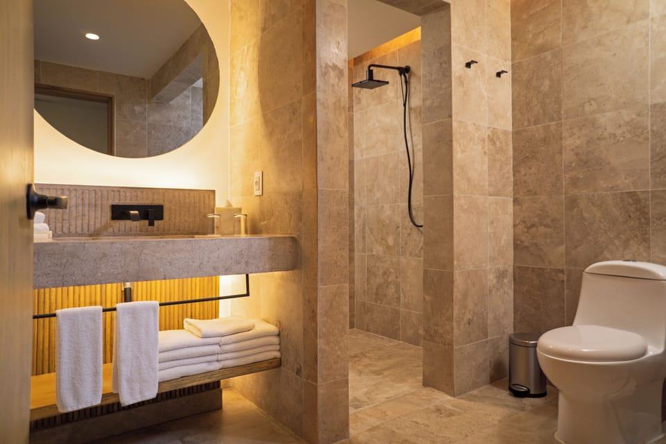 Shower, free toiletries, hair dryer, bathrobes