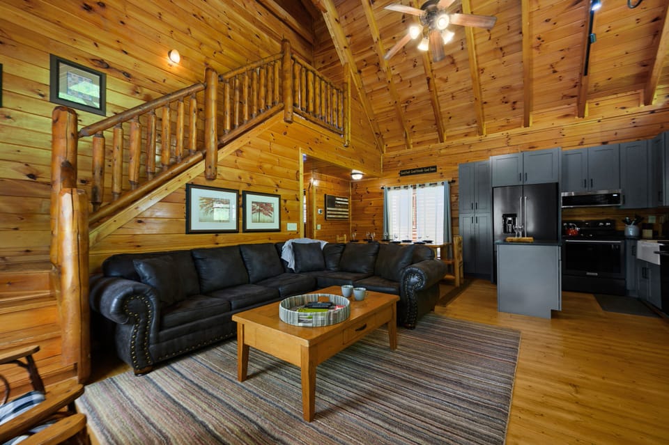 Main room with stairs to master suite 