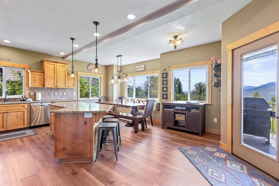 Kitchen has a beautiful view of Snowbasin and more