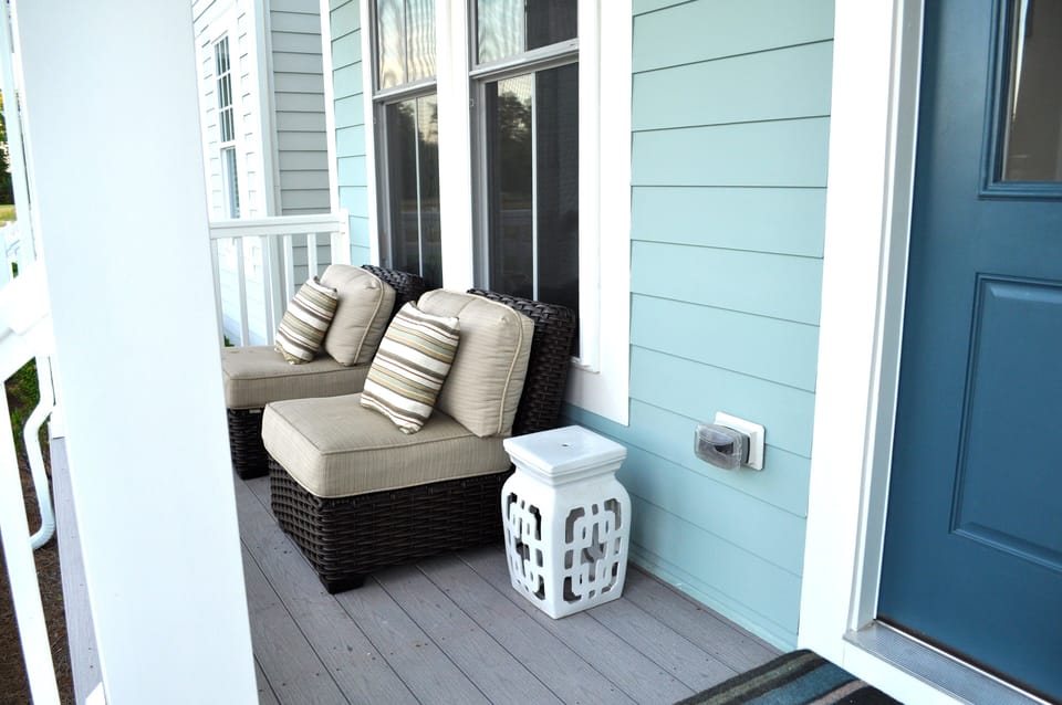 Front porch perfect for coffee in the mornings or wine in the evenings