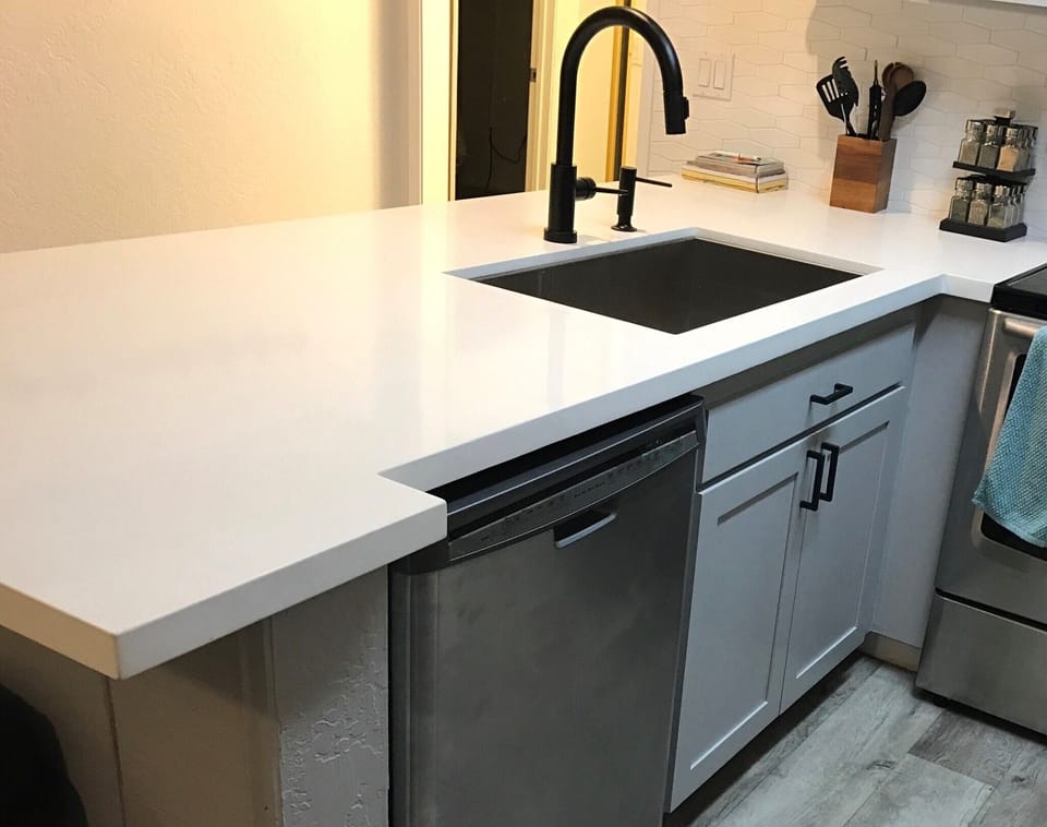 Remodeled kitchen with quartz counters, Stainless appliances and "touch " faucet