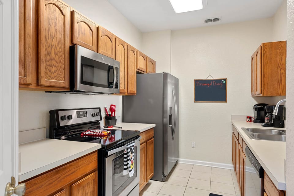 Stainless steel fridge, stove, microwave and dishwasher