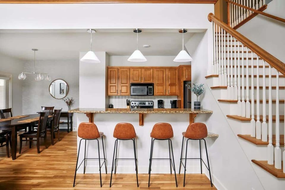 Bar stools add the perfect perch for easy dining, conversation, or a cozy start to the day.