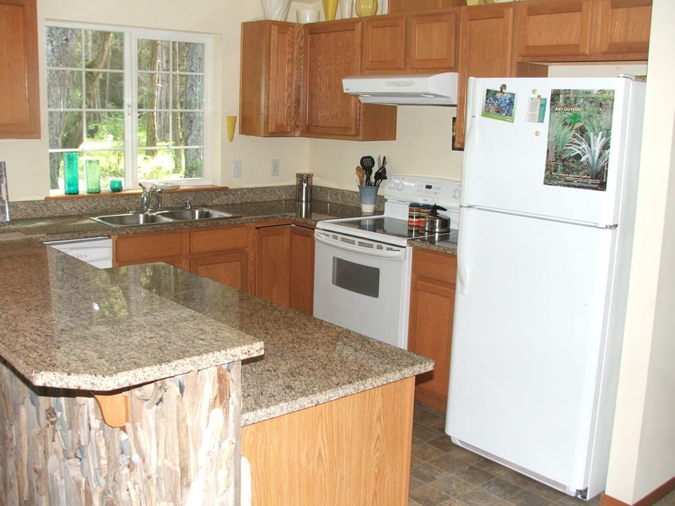 Fully appointed kitchen. Basic dishes, cookware, and pantry items provided.