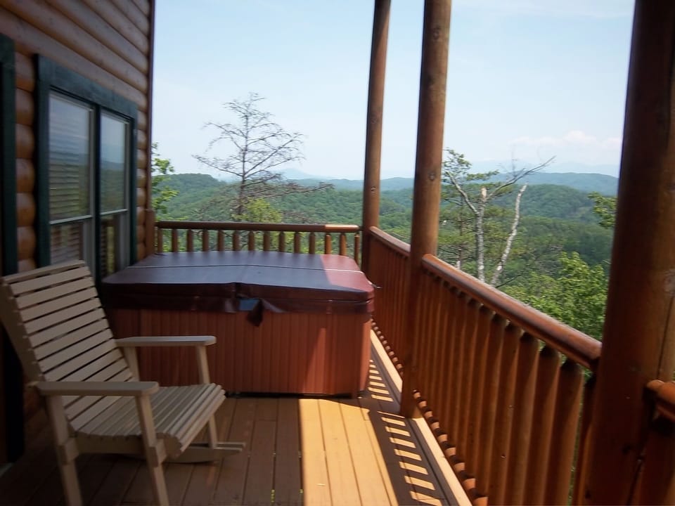 Hot tub on Lower level Deck. Great place for the younger adults to hang out and have their own space